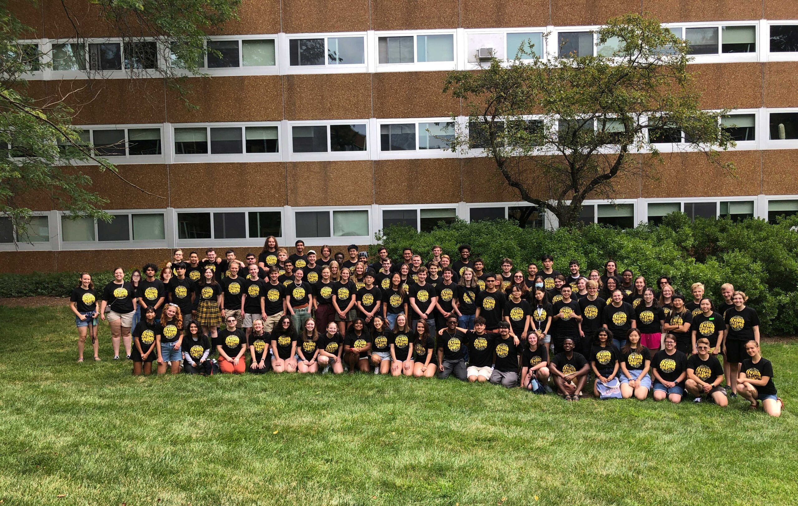 Living Arts Engine group photo in front of dorms